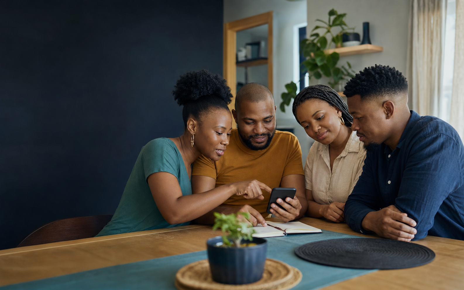 African friends choosing a Stokvel saving plan